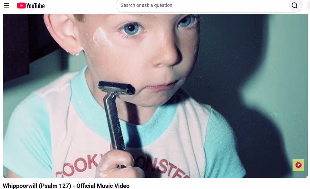 YouTube thumbnail cover for the song "Whippoorwille (Psalm 127)" child-pretending-to-shave